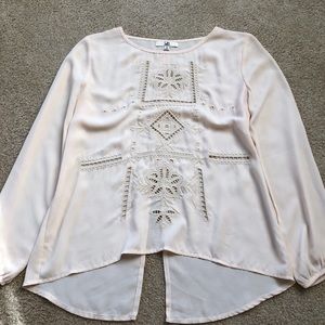 Embroidered slit back top